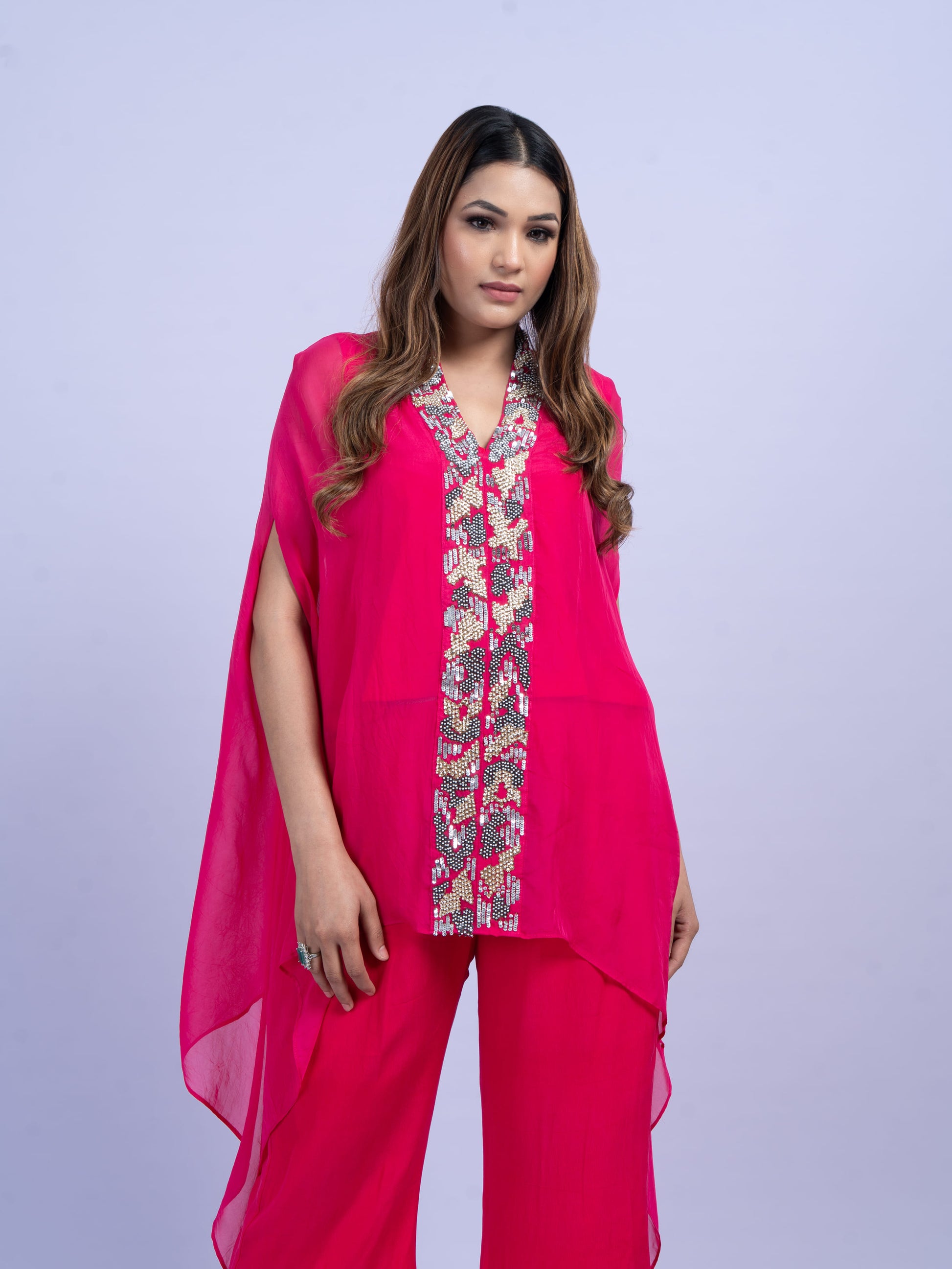 Rani pink coord set with hand embroidery paired with bell bottom pants