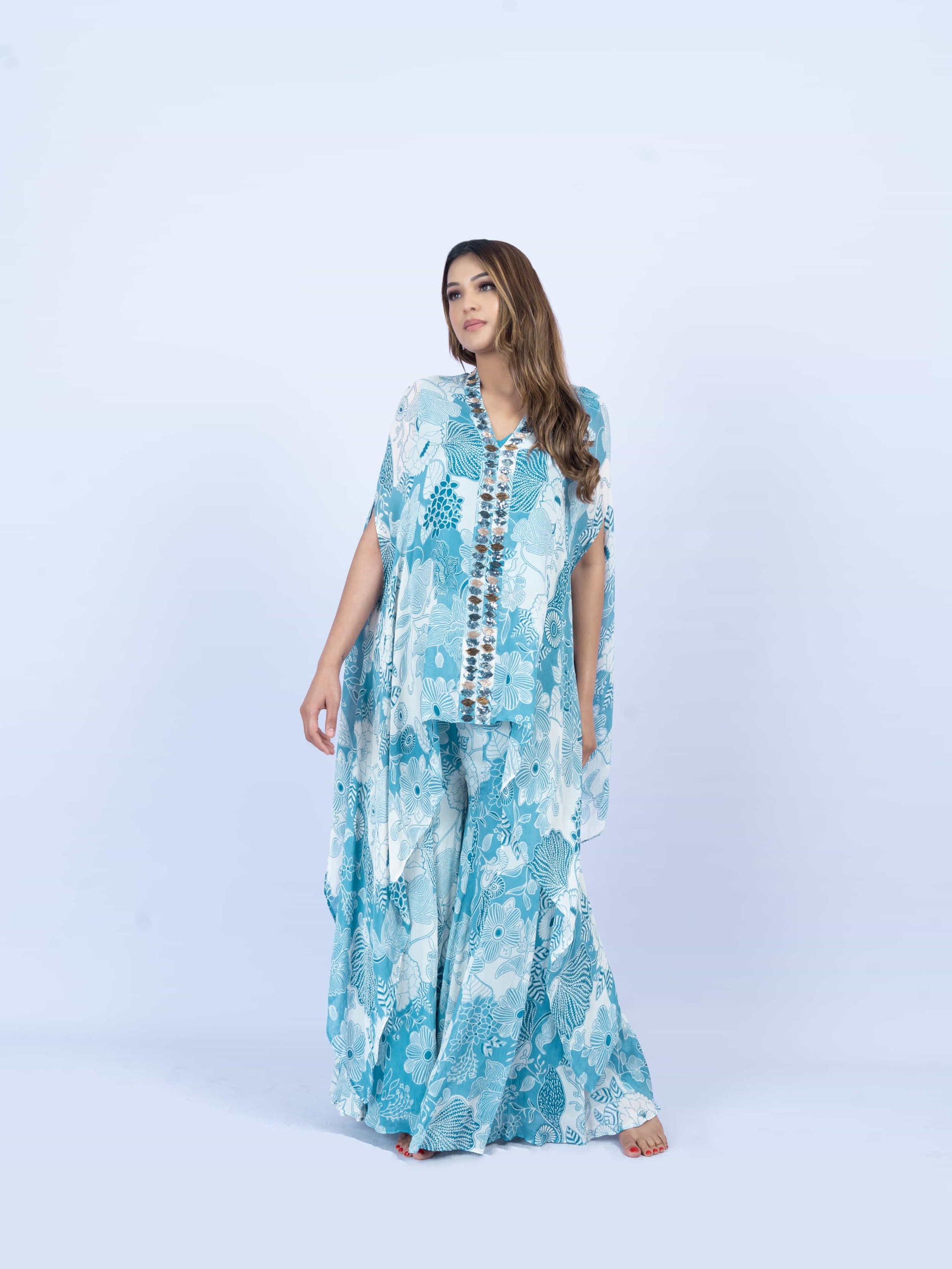 Printed cape set with embroidery on the front paired with printed sharada