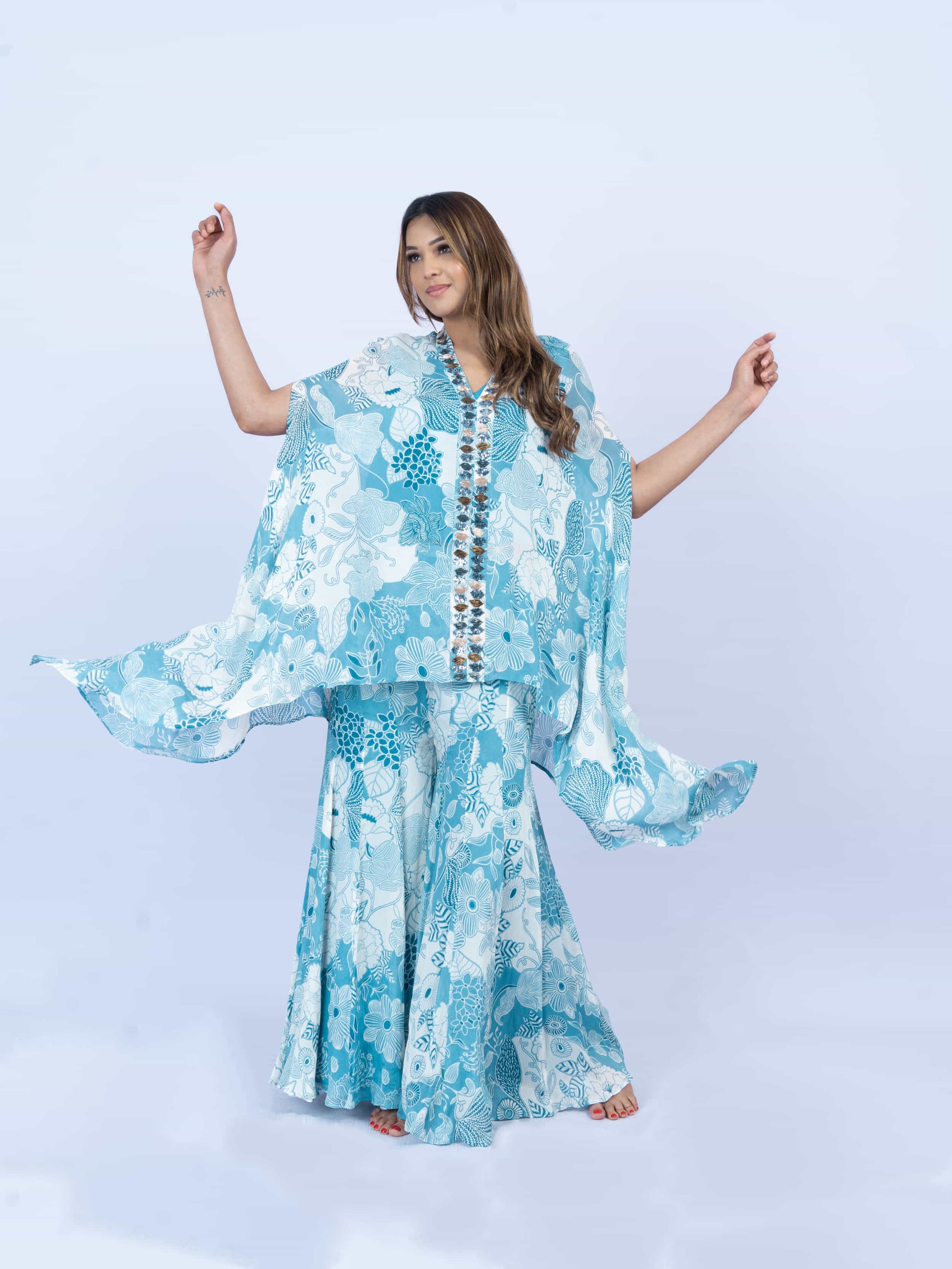 Printed cape set with embroidery on the front paired with printed sharada