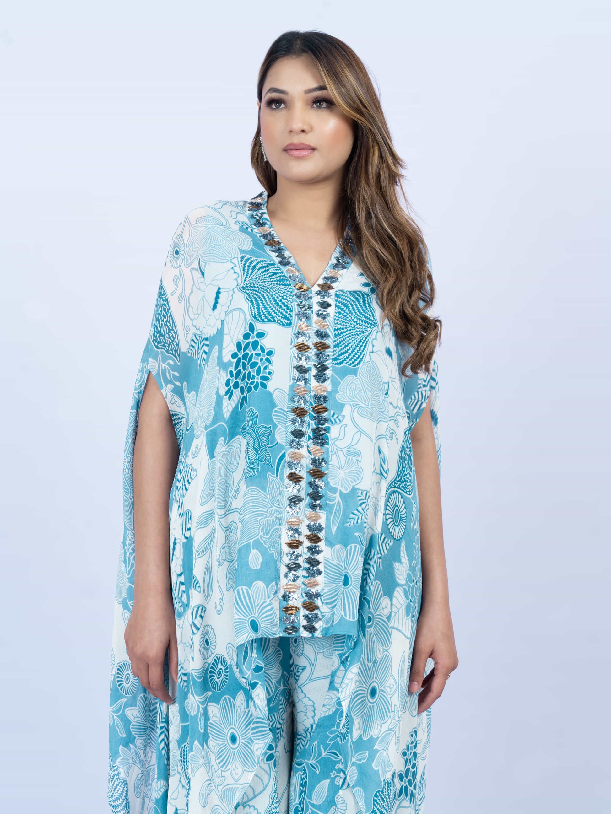 Printed cape set with embroidery on the front paired with printed sharada