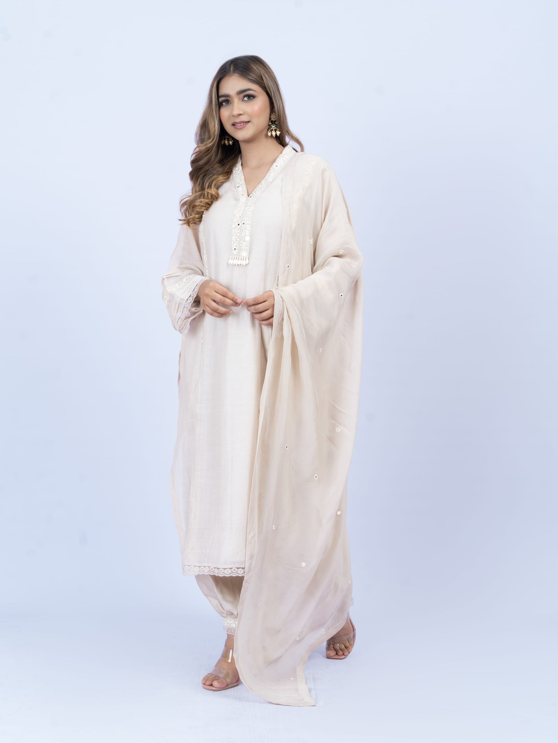 Solid kurta set with hand embroidery on neck and dupatta paired with payjami pant