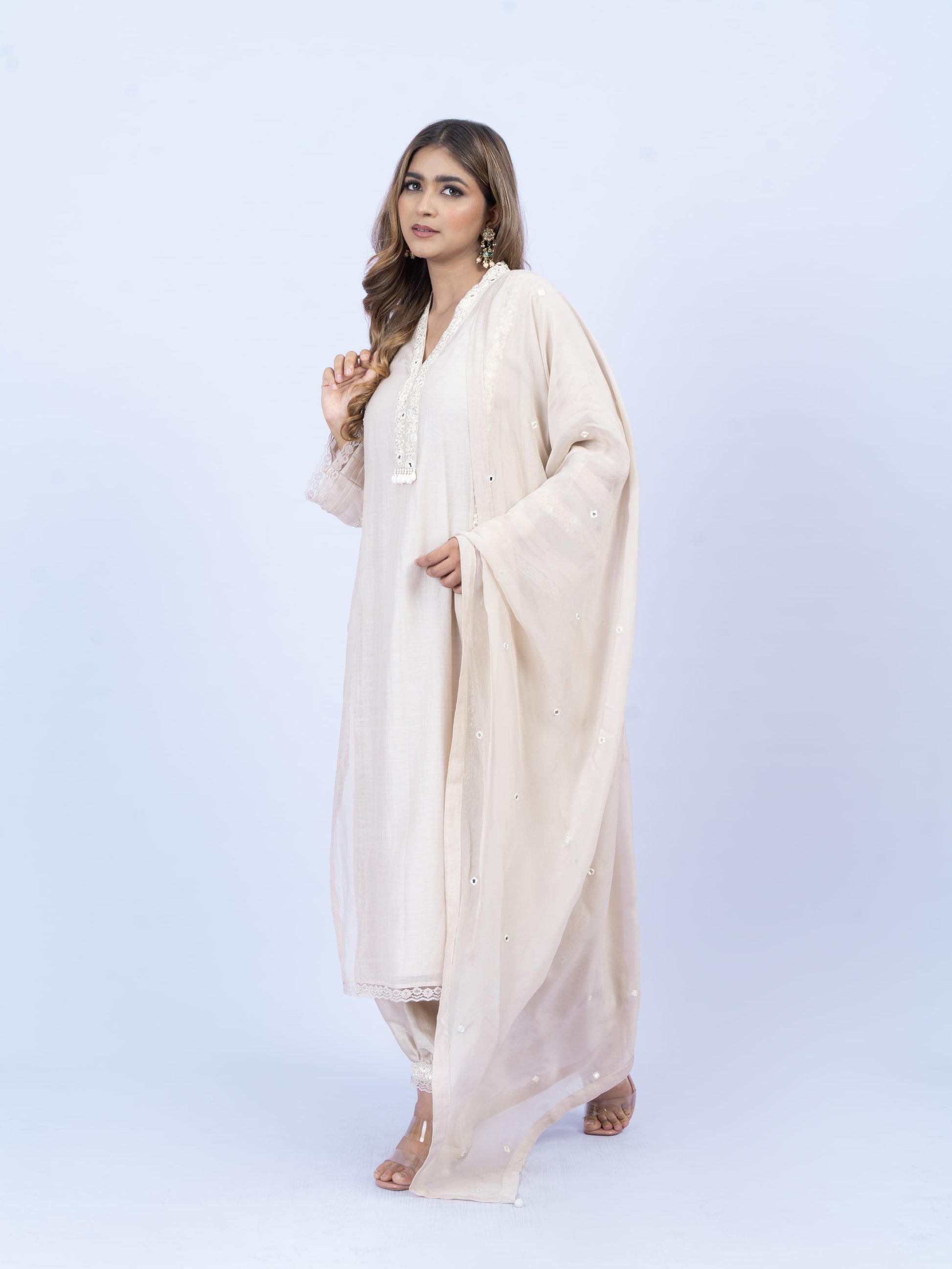 Solid kurta set with hand embroidery on neck and dupatta paired with payjami pant