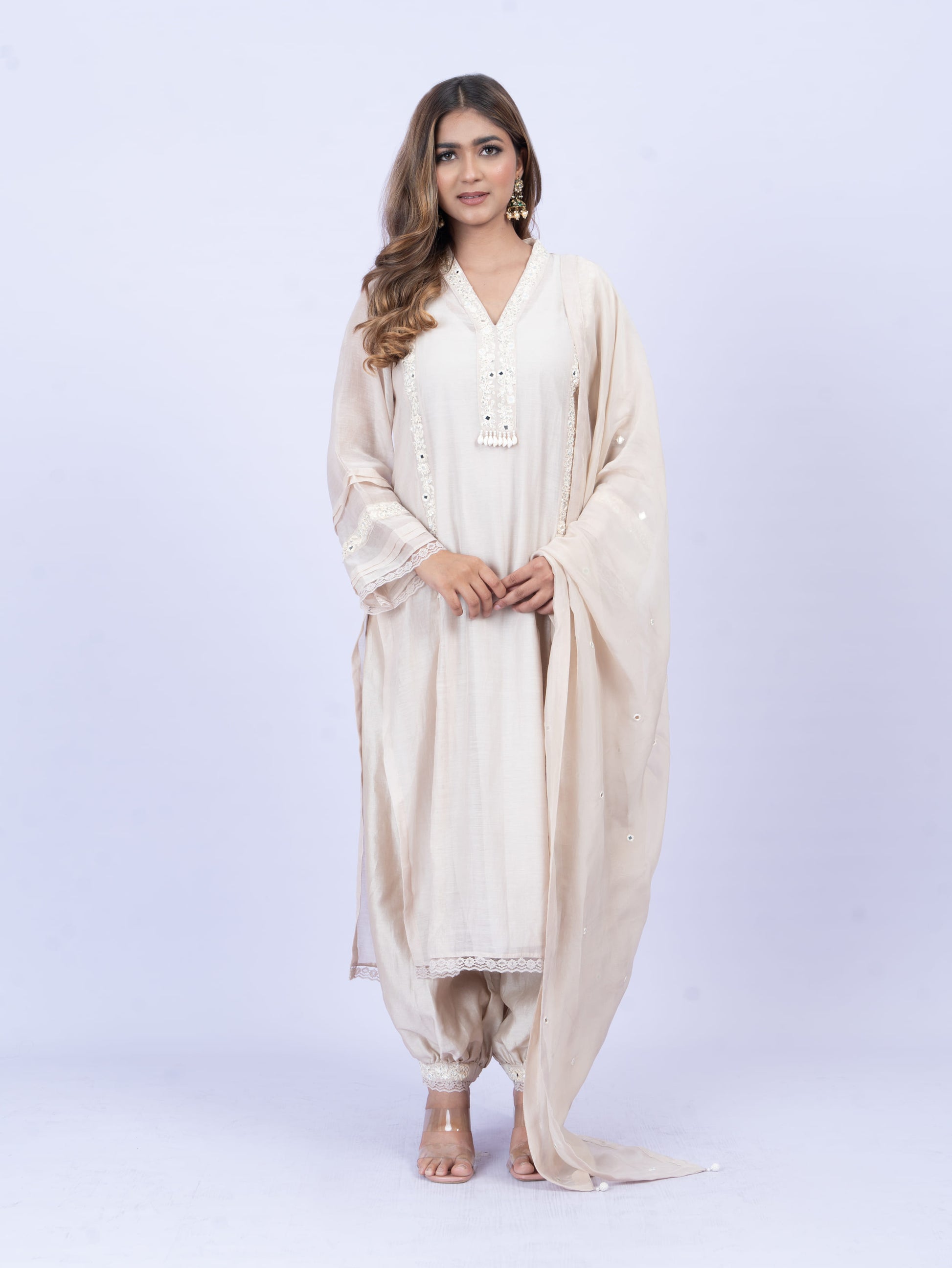 Solid kurta set with hand embroidery on neck and dupatta paired with payjami pant