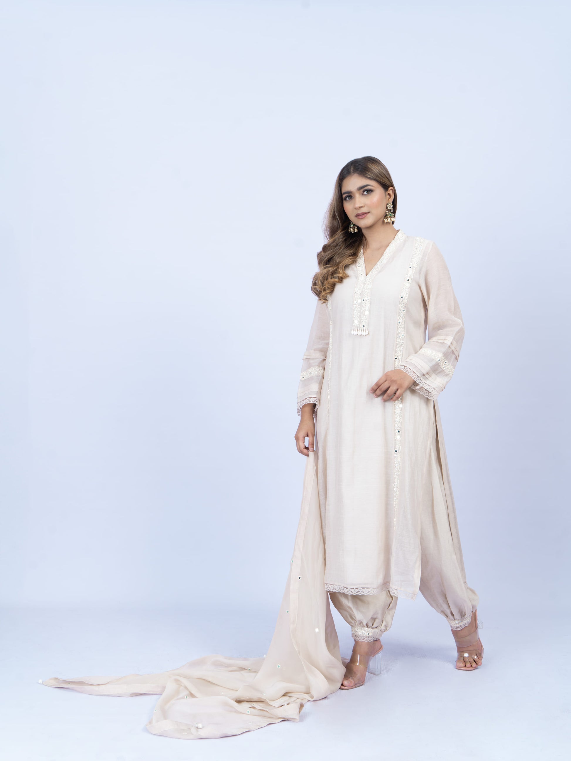 Solid kurta set with hand embroidery on neck and dupatta paired with payjami pant