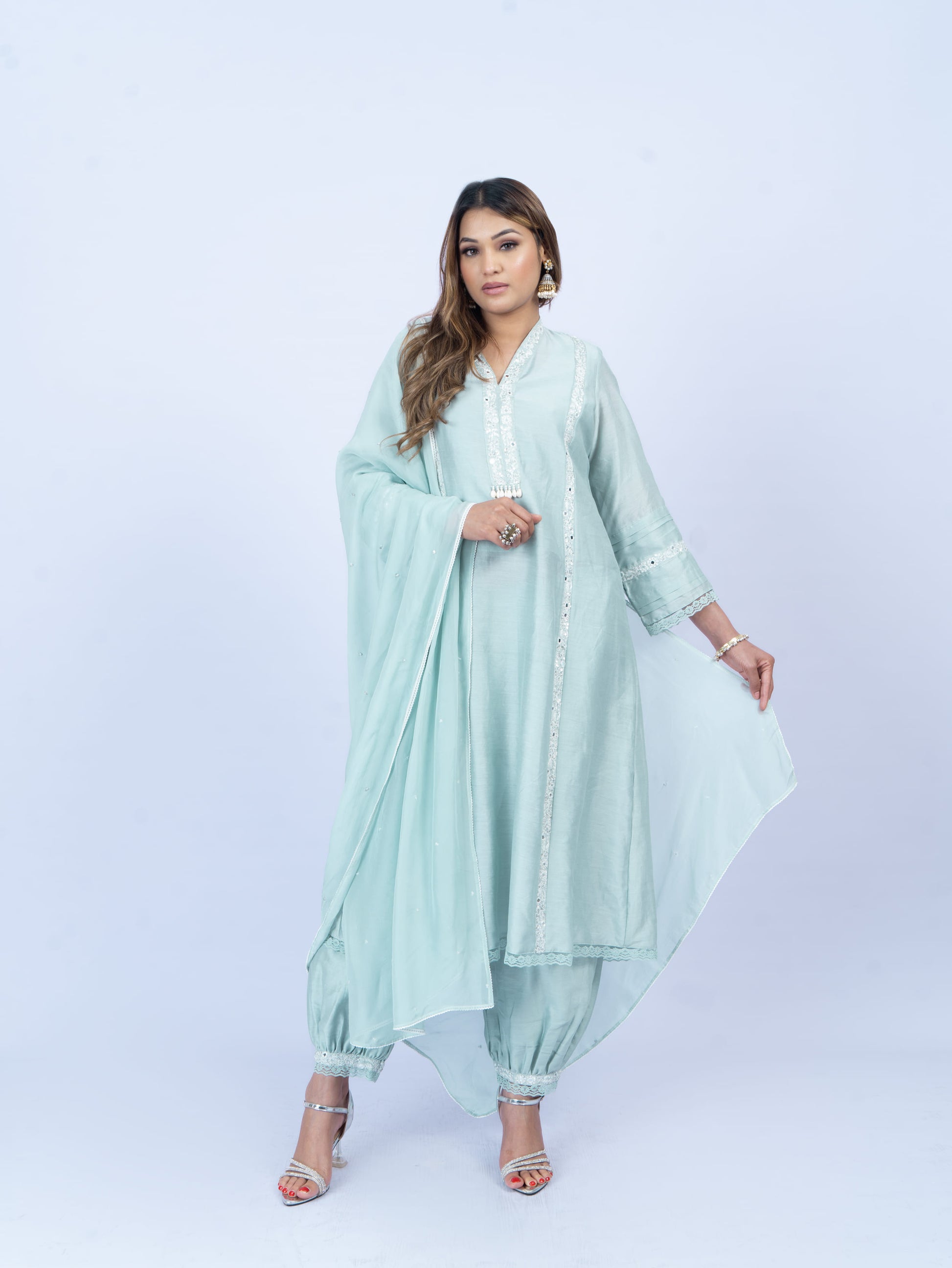 Solid kurta set with hand embroidery on neck and dupatta paired with payjami pant