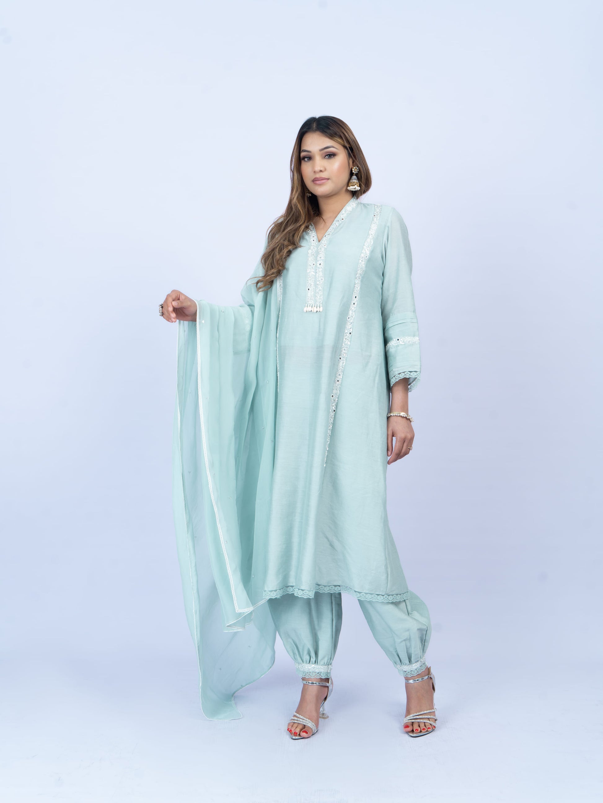 Solid kurta set with hand embroidery on neck and dupatta paired with payjami pant