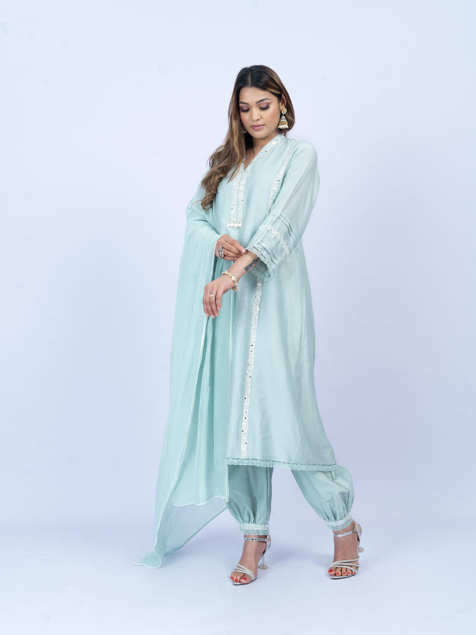 Solid kurta set with hand embroidery on neck and dupatta paired with payjami pant