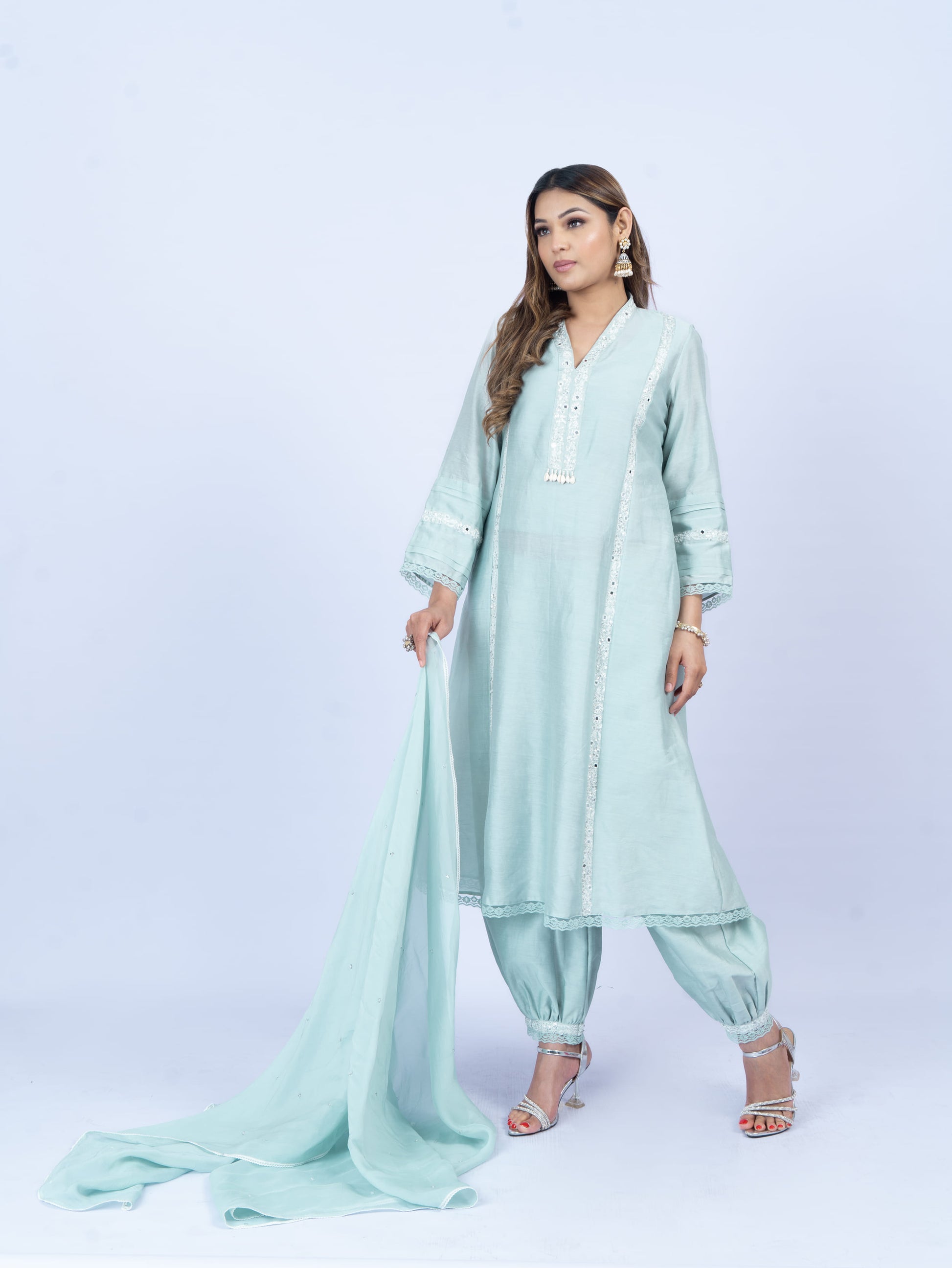 Solid kurta set with hand embroidery on neck and dupatta paired with payjami pant