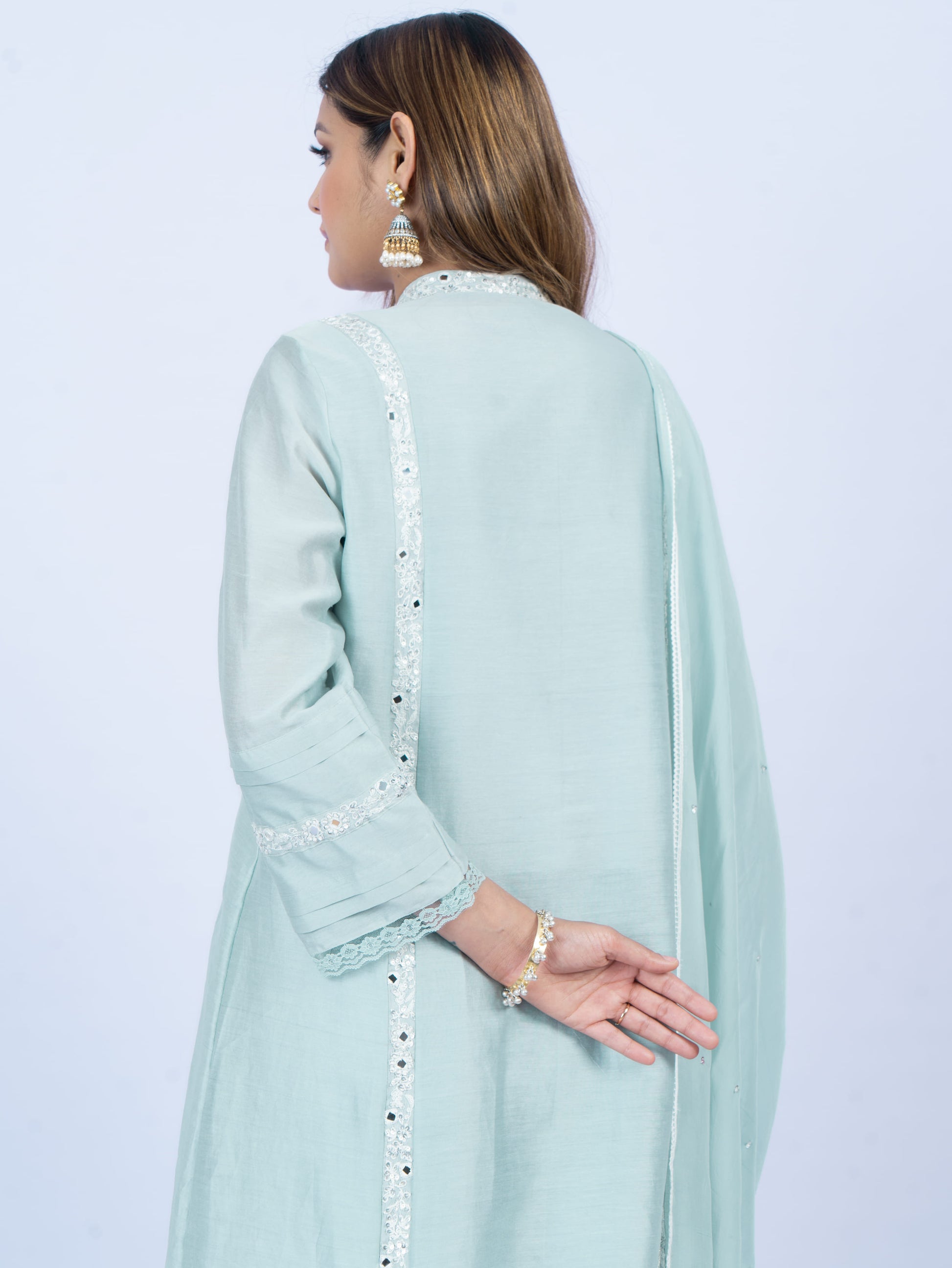Solid kurta set with hand embroidery on neck and dupatta paired with payjami pant