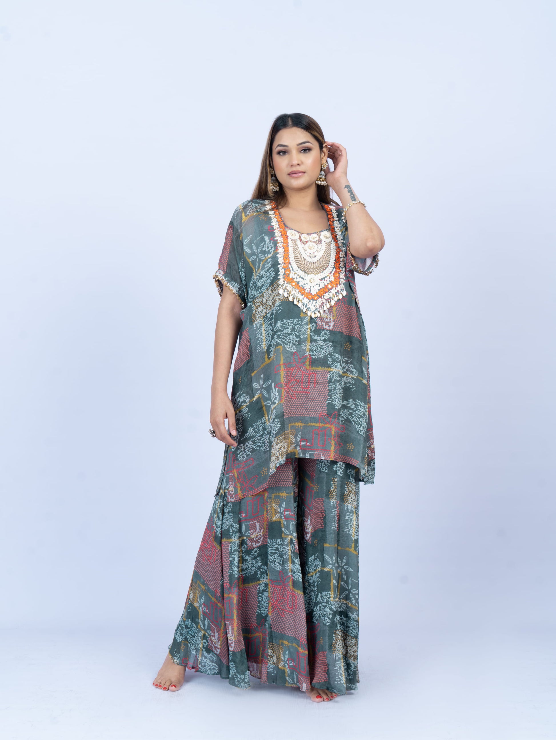 Printed kurta set with hand embroidery on neck