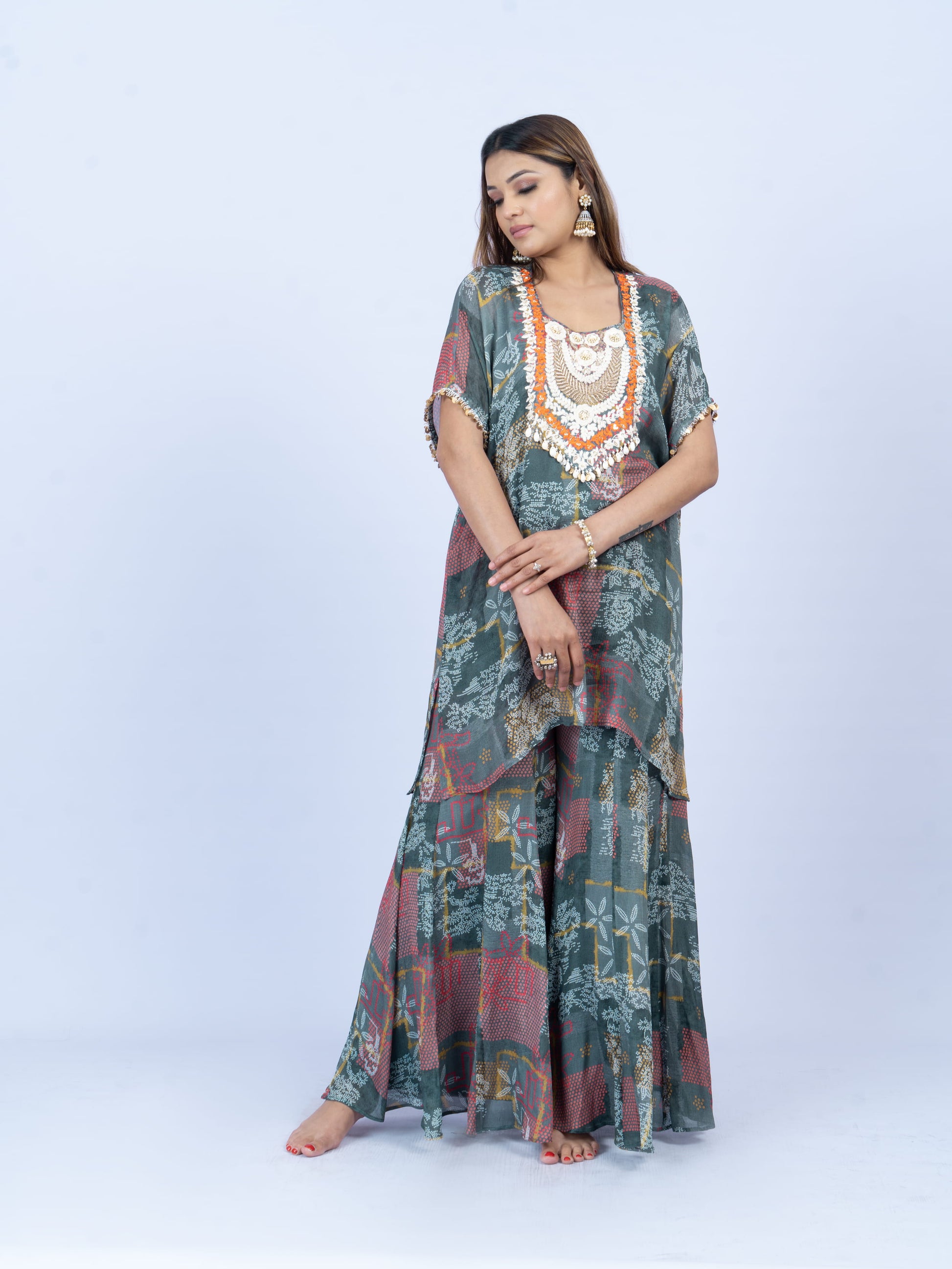 Printed kurta set with hand embroidery on neck