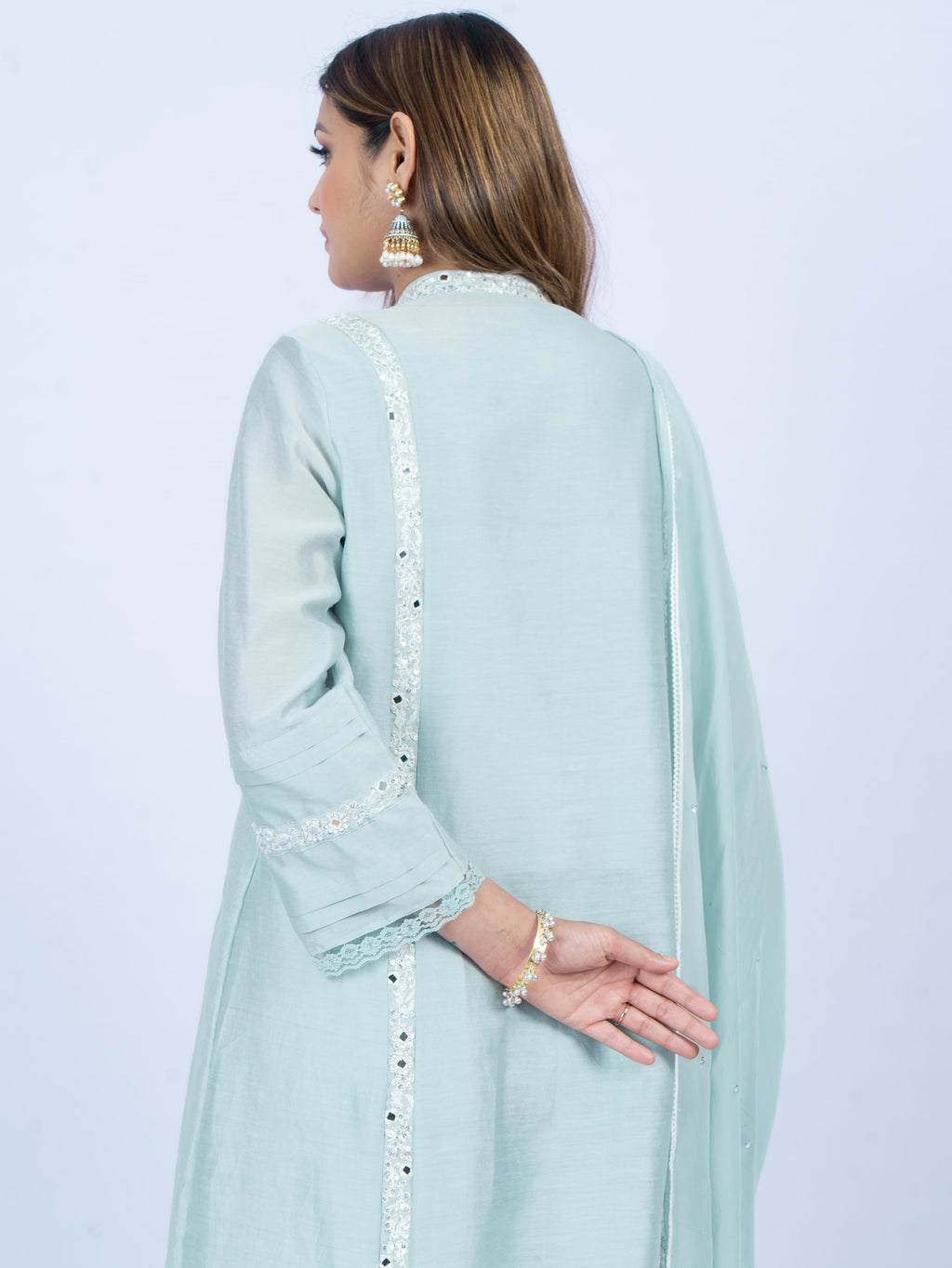 Solid kurta set with hand embroidery on neck and dupatta paired with payjami pant